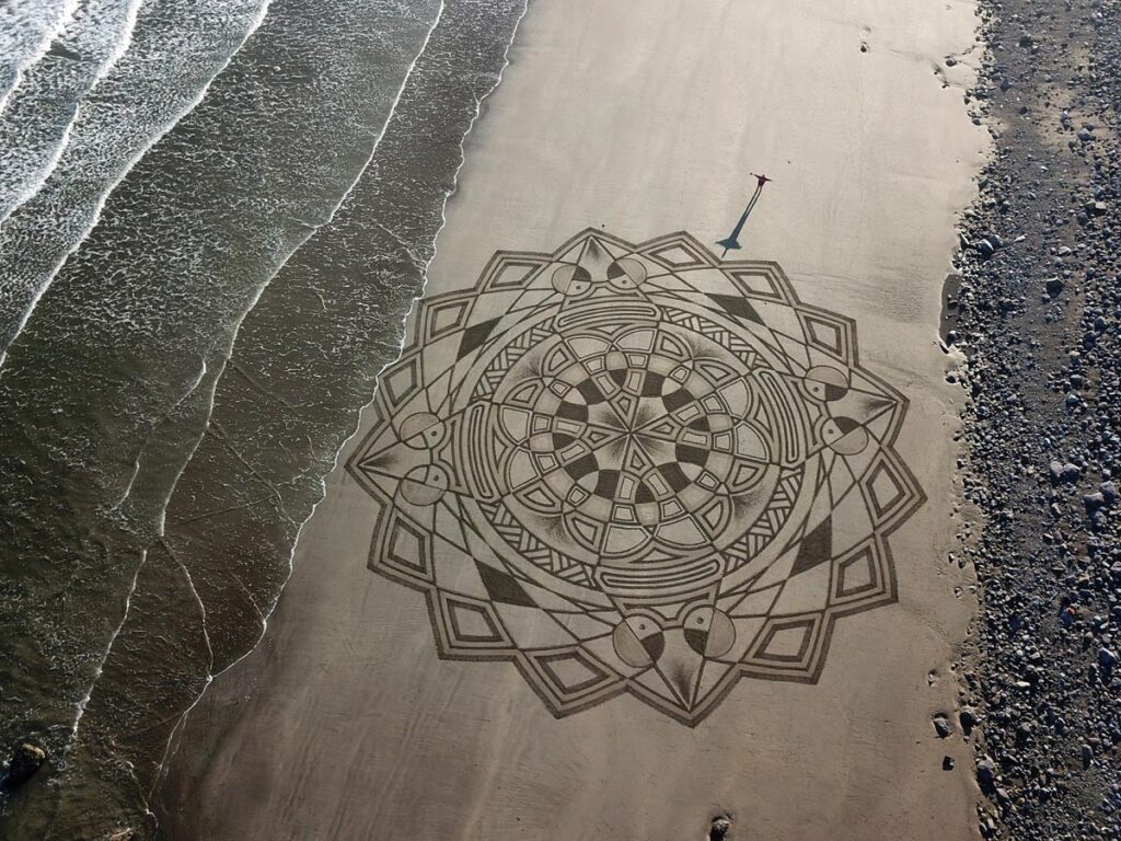 Irish Artist Manu Creates Sand Art on Irish Beaches
