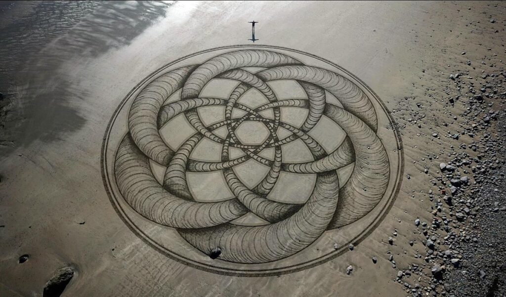 Irish Artist Manu Creates Sand Art on Irish Beaches